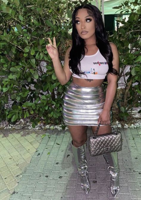 Pinterest @sarstephenn ʚɞ Sliver Skirts Outfit, Houston Nightlife Outfits, Outfit Ideas With Silver Boots, Chrome Skirt Outfit, Chrome Outfit Ideas, Silver Bubble Skirt, Metallic Skirt Outfit, Fye Outfits, Birthday Skirt