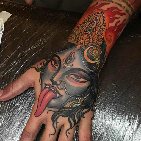 Kali Tattoos: Meanings, Common Themes & Artists Kali Hand Tattoo, Mother Kali Tattoo, Kaali Maa Tattoo Designs, Maha Kali Tattoo, Traditional Kali Tattoo, Kali Goddess Tattoo, Kali Tattoo Design, Kali Ma Tattoo, Mataji Photo