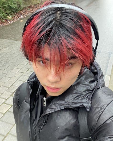 asian handsome model with red hair in the raib wearing a ouffer jacket Black Hair Red Tips, Black Roots Red Hair, Pelo Color Borgoña, Boys Dyed Hair, Red Hair Tips, Red Hair Boy, Boys Colored Hair, Fade Hairstyle, Short Dyed Hair