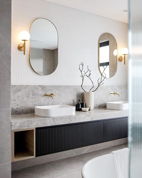 Temple & Webster on Instagram: “Ultimate bathroom goals by @cbcinteriorstylist 😍 We just can't get enough. 📸 @cbcinteriorstylist . . . #templeandwebster #homewares…” Hotel Lobby Bathroom, Modern Luxe Interior Design, Contrast Bathroom, Reeded Door, Bathroom 2023, Oval Mirrors, Stone Vanity, Restroom Design, Washroom Design