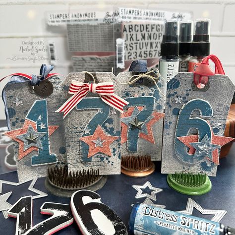 Patriotic Tags with BRAND NEW Tim Holtz Distress Spritz – Nichol Spohr LLC Nichol Spohr, Tim Holtz Stamps, Pencil Storage, Pretty Pink Posh, Creation Crafts, Whimsy Stamps, Wood Pens, Elizabeth Craft, Etched Designs