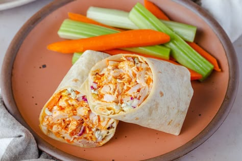 Quick, satisfying, and make-ahead-friendly. Buffalo Chicken Wrap Recipe, Blue Cheese Coleslaw, Buffalo Chicken Wraps, Chicken Wrap Recipes, Cow Cheese, Cold Lunches, Tortilla Wraps, Chicken Wraps, Canned Chicken