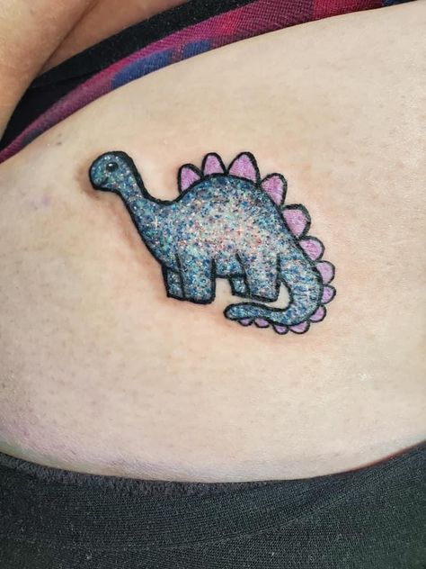 #glittertattoo #glitter #dinotatto #tattoo #tattooideas Real Glitter Tattoo Ideas, Colorful Glitter Tattoo, Glitter Ghost Tattoo, Glow Worm Tattoo, Small Glitter Tattoo, Glitter Style Tattoo, Glitter Tattoos Real, Glitter Tattoo Permanent, Glitter Tatoos