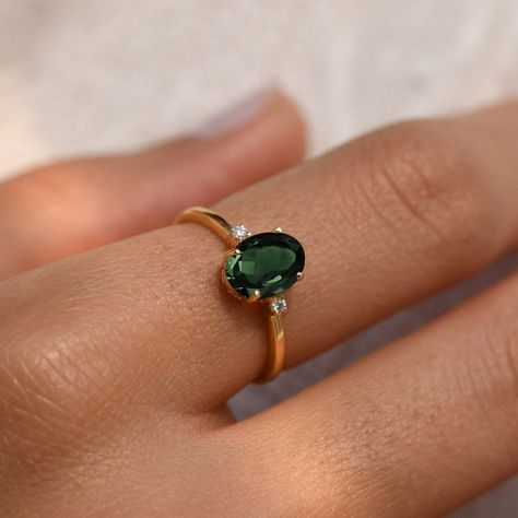 Green sapphire engagement ring