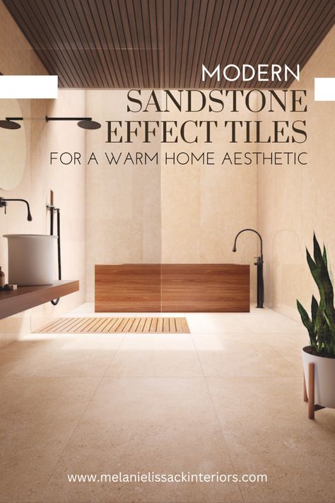 Use sandstone effect tiles on the wall or the floor of a bathroom for a modern and warm home aesthetic. The soft beige and taupe tones of natural sandstone have a rustic, continental appeal that is synonymous with warmer climes and therefore evokes a cosy aesthetic, creating a space upon which you would want to spend time in. Bathroom Warm Tones, Bathroom Tiles Blue, Timeless Bathroom Tile, Marble Bathroom Tiles, Blue Bathroom Design, Stone Tile Bathroom, Inviting Bathroom, Cosy Bathroom, Warm Home Aesthetic