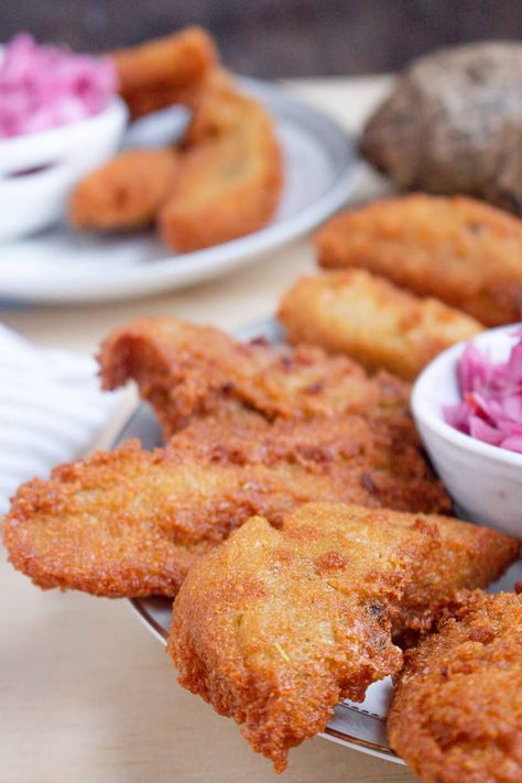 Also known as Malanga Fritters (Haitian Akra), this is a crunchy appetizer that is common throughout Haiti. Haitian Akra uses a native root vegetable mixed with flavorful herbs and spices to form a batter, which is then deep fried to crispy, golden perfection. #haitian #akra #accra #malanga #fritters #savorythoughts @Msavorythoughts Accra, Haitian Akra, Haitian Pate, Haitian Food, Haitian Food Recipes, Root Vegetable, Red Herring, Root Vegetables, Deep Fried