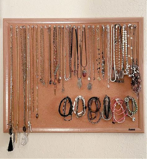 This is one of my favorite ways to store jewelry and to keep your necklaces and bracelets from tangling. Get a big cork board and large clear thumbtacks. Hang a few necklaces on each thumbtack. Do the same for bracelets. Efficient and inexpensive! Big Cork Board, Ways To Store Jewelry, Cork Board Jewelry, Room Organisation, Store Jewelry, Necklaces And Bracelets, Cork Board, Cute Jewelry, Tangled