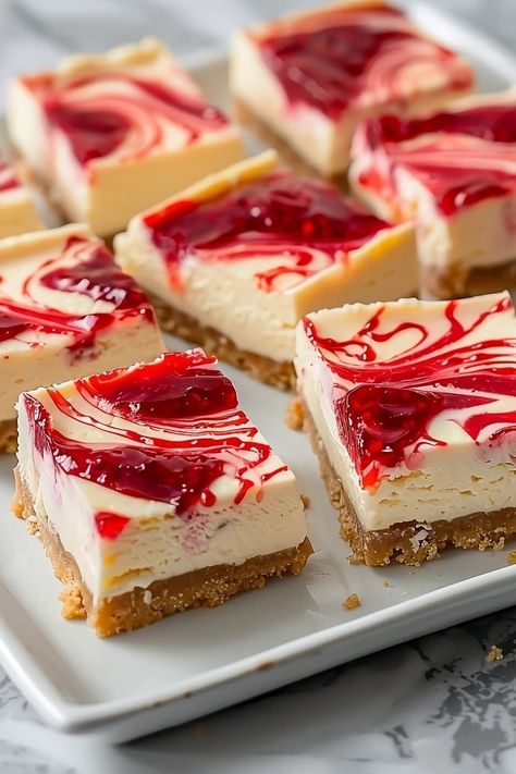 Dessert doesn't get better than these easy strawberry cheesecake bars. They're everything you love in the classic dish, only served in convenient squares. Raspberry Cheesecake Bars, Easy Strawberry Cheesecake, Strawberry Cheesecake Bars, Cheesecake Squares, Fresh Strawberry Pie, Strawberry Dessert Recipes, Raspberry Cheesecake, Easy Strawberry, Strawberry Desserts