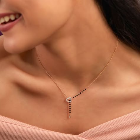 New Mangalsutra Designs For The Millennial Bride Mangalsutra Chain, Delicate Gold Jewelry, Black Beads Mangalsutra, Black Beads Mangalsutra Design, Diamond Pendants Designs, Fancy Jewelry Necklace, Gold Mangalsutra Designs, Gold Bridal Jewellery Sets, Jewelry Set Design