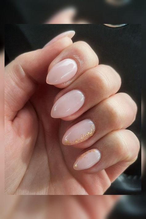 Fashionable and Glamorous: Enhance your nails with these breathtaking lip gloss gel nails adorned with dazzling gold foil, adding a touch of sophistication and sparkle to your overall look. Get ready to shine! 💅💋 // Photo Credit: Instagram @thenailschile Pink And Gold Oval Nails, Pastel Pink And Gold Nails, Soft Pink And Gold Nails, Blush Pink Nails With Design, White And Gold Oval Nails, Blush Pink And Gold Nails, White Nails With Pink Accent, Pink Nails Gold Accent, Pink And Gold Manicure