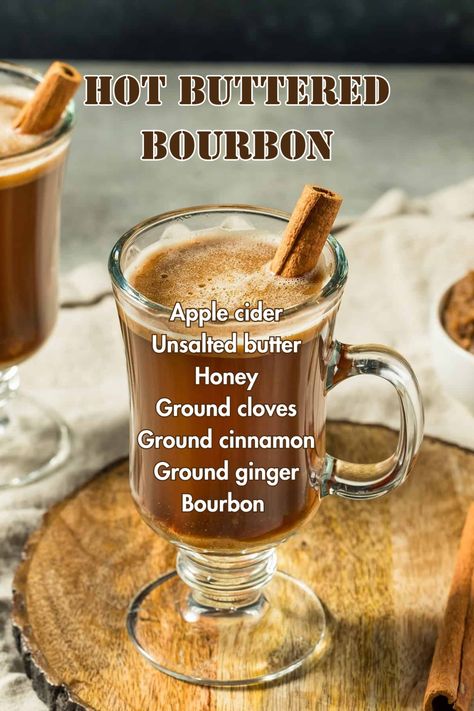 Hot buttered bourbon in a heat-resistant glass mug with a cinnamon stick, giving off a cozy, rich look for winter nights. Hot Buttered Bourbon, Warm Boozy Drinks, Hot Bourbon Drinks, Warm Whiskey Cocktails, Warm Whiskey Drinks, Burbon Drinks, Buttered Bourbon, Hot Winter Cocktails, Yum Drinks