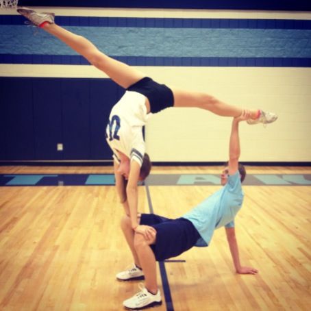 Cheerleader 2 person stunts. Me and hunter(: Acrobatic Tricks, Yoga For Two, 2 Person Stunts, Partner Acrobatics, Acro Yoga Poses, Acro Gymnastics, Gymnastics Tricks, Cheerleading Stunt, Couples Yoga