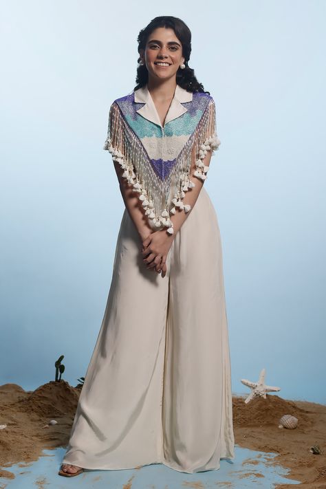 Shop for these amazing collections of Ivory Crepe Embroidered Cutdana Embellished Tasselled With Jumpsuit For Women by Eclat by Prerika Jalan online at Aza Fashions. Pearl Cape, Solid Jumpsuit, Jumpsuit For Women, Indian Dresses Traditional, Designer Dresses Casual, Stylish Party Dresses, Party Wear Indian Dresses, Fancy Dress Design, Stylish Dress Book