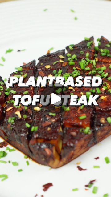 Joris | Vegan Recipes on Instagram: "VEGAN TOFU STEAK
If you already love tofu than this recipe is a must-make 🌱  It will basically turn any sceptic of tofu into a tofu-lover. By marinating the tofu it changes from a bland and boring block to a steak that will blow your mind. Oh and it’s easy to make too. Go give it a try! 

INGREDIENTS:
- 1 block tofu, pad dry
- 1 tbsp sesame oil
- 3 tbsp light soy sauce
- 1 tbsp tomato paste
- 1 tbsp rice wine vinegar
- 2 tbsp agave syrup
- 1 tsp garlic powder
- 1 tsp onion powder
- Salt & pepper
- Chili flakes
- Chives

METHOD
1. Cut the tofu block into 2 big slabs. Put 2 chopsticks to the side of it so your knife doesn’t go fully through. Cut and score the tofu in a criss cross pattern. 
2. Meanwhile mix the ingredients for the marinade. Add the tofu Tofu Steak, Criss Cross Pattern, Vegan Tofu, Agave Syrup, Rice Wine Vinegar, Rice Wine, Wine Vinegar, Chili Flakes, Sesame Oil