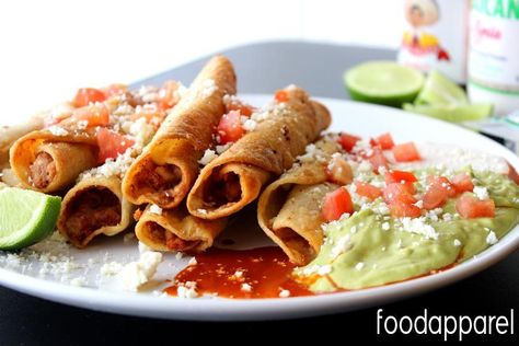 Easy Mexican Bean Taquitos Recipe | Food Apparel Flour Tortilla Taquitos, Bean Taquitos Baked, Freezable Taquitos, Taquitos With Rice And Beans, Creamy Black Bean Taquitos, Bean And Cheese Taquitos, Bean Taquitos, Taquitos Recipe, Food Mexican