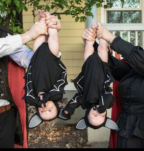 Two babies in bath costumes held upside down Bat And Vampire Family Costume, Family Halloween Costumes With Twins, Vampire And Bat Family Costume, Family Bat Costume, Twin Halloween Costumes For Babies, Twin Baby Halloween Costumes, Baby Twin Halloween Costumes, Twins Halloween Costumes, Bats For Halloween