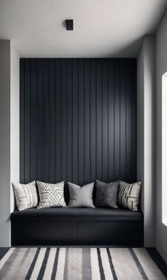 Black Paneling Wall, Interior Slat Wall, Geometric Wall Paneling Ideas, Slatted Wall Hallway, Matt Black Accent Wall, Black Panel Hallway, Black Room Wall Decor, Black And White Home Design, Black Panelling Hallway