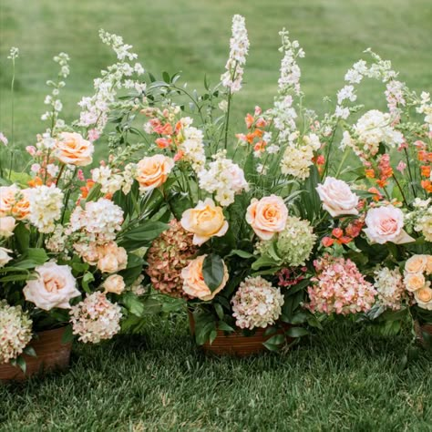 This Grounded Arch consisting of Dephinium, Peegee Hydrangea, Orange Snapdragons and more is designed in an oval container. Snapdragon Wedding, Grounded Arch, Floral Hedge, Ceremony Aisle Flowers, Italian Themed Wedding, Whiskey Wedding, Outdoor Tent Wedding, Flower Arches, Wedding Floral Ideas