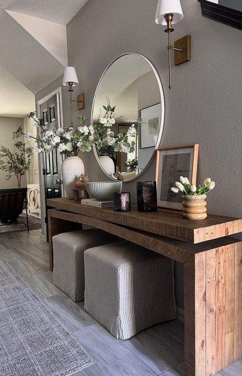 Your entryway sets the tone for your entire home, making it the perfect place to showcase your personal style and welcome guests with open arms. Whether you’re a lover of modern minimalism, rustic farmhouse charm, or eclectic bohemian vibes, there’s an entryway table decor idea waiting to transform your space. In this post, I’ve curated a collection of 30+ entryway table decor ideas that promise to breathe new life into your foyer. Living Room Entry Table, Entry Inspiration, Entrance Table Decor, Hallway Table Decor, Classic Reception, Entryway Table Decor Ideas, Different House Styles, Modern Apartment Living Room, Entry Table Decor