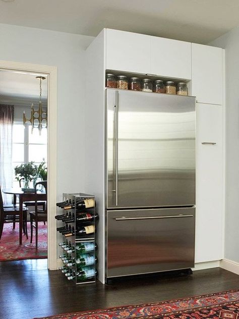 Ideas for Using that Awkward Space Above the Fridge // standing wine rack, rug in kitchen Space Above Fridge, Fridge Placement, Above Fridge, Small Condo Kitchen, Above The Fridge, Kitchen Credenza, Kitchen Dining Room Combo, Kitchen Innovation, Small Condo