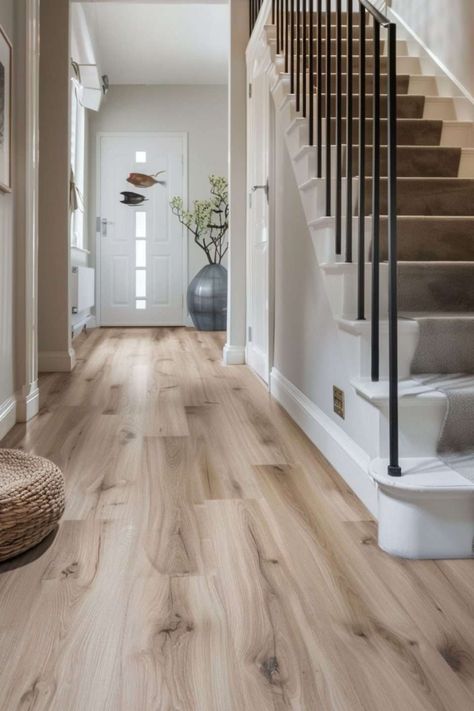 The Top 10 Laminate Flooring Trends You Need to Know - Melanie Jade Design Laminate Flooring With Grey Walls, Laminate Flooring Patterns Ideas, Lament Flooring Ideas, Flooring For Basement Floors, Basement Laminate Flooring, Elegant Flooring Ideas, Luxury Living Room Flooring Ideas, Trending Floors 2023, Neutral Flooring Ideas