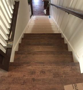 DIY replacing carpeted stairs with laminate flooring. Replace Carpet With Laminate, Replacing Carpet With Laminate, Stairs With Laminate Flooring, Redoing Stairs, Barndominium Stairs, Stairway Makeover, Diy Stairs Makeover, Carpeted Stairs, Lilypad Cottage