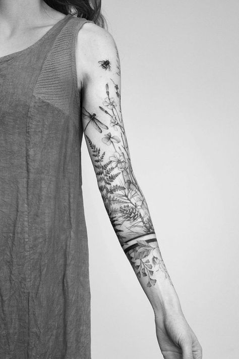 Sleeve tattoos are a popular choice for women who want to stand out from the crowd due to their unique artwork. They range from small, dainty designs to full designs, from the arm to the wrist, and there are many variations to make the ink unique. For those looking to honor their faith, they may be drawn to symbols like a cross or an angel, while those who wish to show traits like loyalty can choose a wolf. filler tattoo ideas for sleeves gap filler tattoo filler ideas ideas for half sleeve Feminine Horror, Sleeve Filler Ideas, Sleeve Filler, Unique Half Sleeve Tattoos, 42 Tattoo, Cream Tattoo, Tattoo Sleeve Filler, 50 Tattoo, Arm Sleeve Tattoos For Women