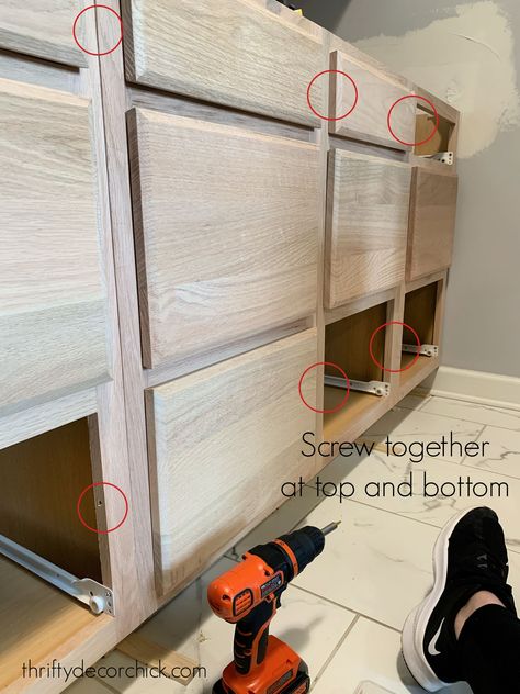 How to Create Custom DIY Built Ins With Stock Cabinets | Thrifty Decor Chick | Thrifty DIY, Decor and Organizing Built Ins With Stock Cabinets, Diy Built In Storage, Cabinets For Laundry, Diy Built Ins, Unfinished Kitchen Cabinets, Unfinished Cabinets, Stock Kitchen Cabinets, Built In Entertainment Center, Built In Shelves Living Room