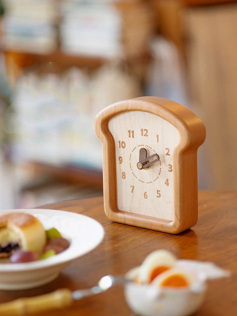 Infuse your home with creativity and humor with our whimsical toast bread silent desk clock. This innovative clock resembles a slice of toast bread, combining practical functionality with a playful design for a delightful home décor accent.Playful Design: Resembles a slice of toast bread, adding a cheerful and unique twist to traditional clocks. Material:woodenS Size:14.3cm(L)*15.5cm(H)L Size:20.5cm(L)*22.3cm(H) (1 inch=2.54cm) Creative Clock Design, Cute Home Items, Food Shaped Decor, Bread Craft, Playful Office, Aesthetic Clock, Crockery Design, Desk Items, Cute Desk Accessories