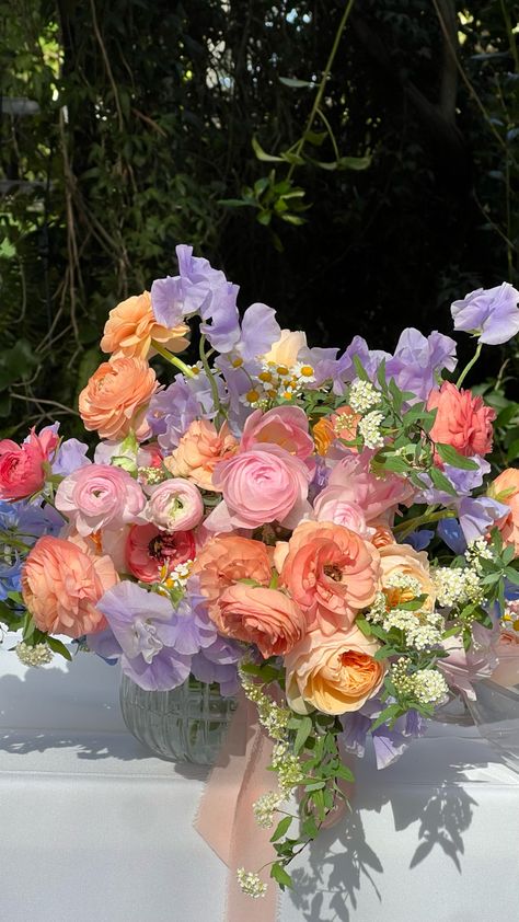 Peach ranunculus bouquet May Flowers Bouquet, Purple And Peach Bouquet, Flower Garden Wedding Ideas, Peach And Lavender Bouquet, Lavender Garden Wedding, Lavender And Peach Wedding Decor, Wildflower Garden Wedding, Bridgerton Flower Arrangements, Types Of Flowers For Wedding