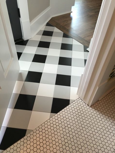 Here are 15 Mind Blowing Floor Designs that are sure to inspire! Put the drama on the floor with these unique floor inspirations! Black And White Checkered Floor, Checkered Floor, Tile Stickers Kitchen, Barn Light Electric, Wall Waterproofing, Floor Tile Design, Flooring Inspiration, Unique Flooring, Grey Tiles