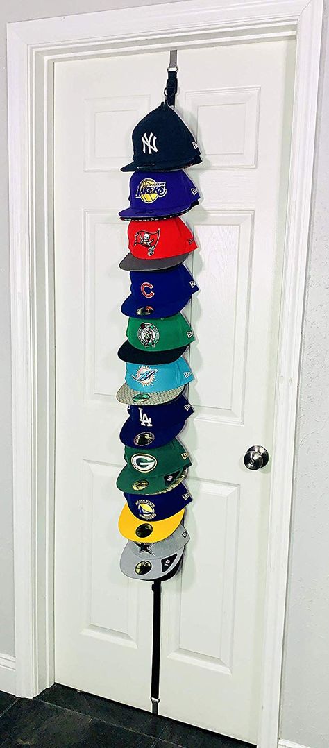 Hanging Closet Doors, Hat Hanging Ideas, Baseball Hat Display, Closet Wall Organizer, Baseball Hat Storage, Hang From Ceiling, Baseball Cap Rack, Baseball Hat Racks, Baseball Caps Storage