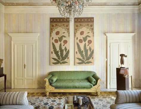 Design by Laura Sartori Rimini and Roberto Peregalli. Subtly striped walls create a serene, earthy setting for the Asian artworks that dealer and collector Emil Mirzakhanian displays in his Milan apartment; 18th- century Indian floral paintings hang above the living room’s Anglo-Indian sofa. Gallerie Magazine (Winter 2017). Studio Peregalli, Romantic Interior, Milan Apartment, Asian Artwork, Living Room Mantel, Striped Walls, European Paintings, Life Ideas, Art Life