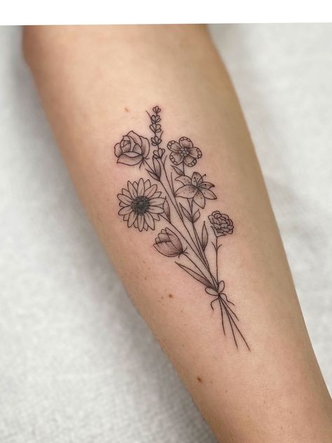 Five Flower Bouquet Tattoo, Black And White Birth Flower Tattoo, Sunflower And Rose Bouquet Tattoo, Bouquet With Ribbon Tattoo, Small Floral Forearm Tattoo Women, Five Flowers Tattoo, Flower Arrangements Tattoo, Mixed Flower Bouquet Tattoo, 7 Flower Bouquet Tattoo