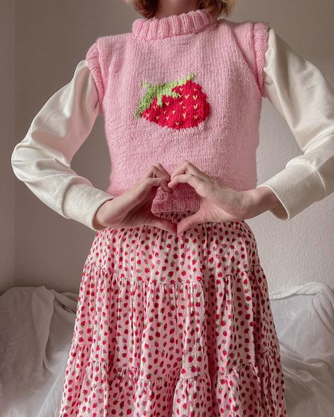 ⋆.˚𐙚❀ 🍓 strawberry sweater vest 🍓 ❀𐙚⋆.˚ Lately I’ve been really into knitting, especially sweater vests. I started this a few weeks ago on my trip to france and finished it on a rainy evening two weeks ago. 🌧️ In comparison to crocheting, knitting is a lot more repetitive and calming on the mind. I especially love the clicking of the knitting needles together. 🧶 #knit #knitting #fibreart #sweatervest #coquette #strawberry #cottagecore Red Crochet Ideas, Strawberry Sweater Vest, Knit Strawberry, Strawberry Cottagecore, Coquette Strawberry, Strawberry Sweater, Strawberry Stuff, Rainy Evening, Knitted Stuff