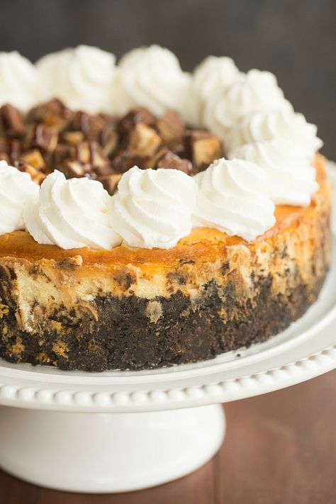 Snickers Cheesecake | browneyedbaker.com #recipe Snickers Cheesecake Recipe, Snickers Torte, Snickers Cheesecake, The Cheesecake Factory, Cheesecake Dip, Harvest Party, Fudge Sauce, Cheesecake Factory, Think Food