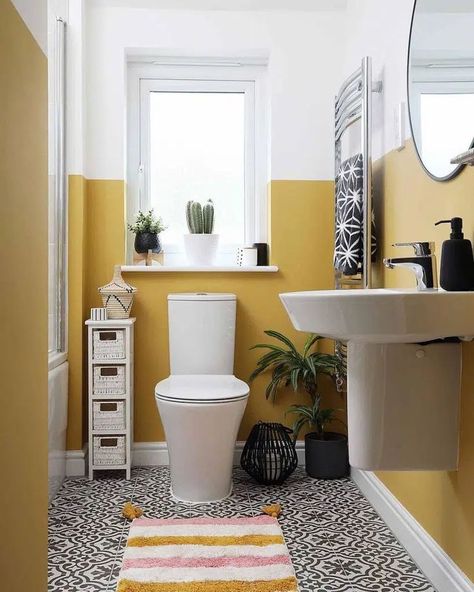 An efficient and stylish minimalistic storage solution by the toilet complements the two-toned yellow walls in this compact bathroom. Image credit: INSTAGRAM @STYLE_THE_HAWTHORNS Yellow Bathroom Accessories, Yellow Shower Curtains, Toilet Room Decor, Small Toilet Room, Compact Bathroom, Retro Bathrooms, Downstairs Toilet, Toilet Room, Small Toilet