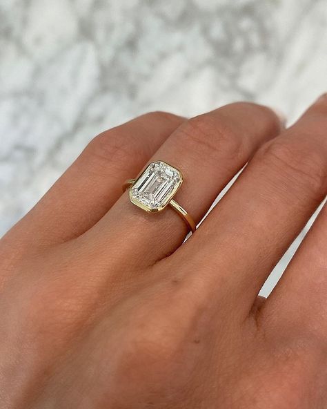 Eye-Catching Emerald Cut Engagement Rings ★ emerald cut engagement rings gold simple classic diamond Flush Fit Engagement Ring, Low Setting Emerald Engagement Ring, Square Art Deco Engagement Ring, Organic Looking Engagement Rings, Embossed Engagement Ring, Flush Ring Setting, Emerald Engagement Cut Ring, Prongless Engagement Ring, Bevel Emerald Diamond Ring