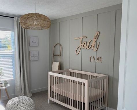 #nurserydecor #nursery #babyboyroom #babyroom Neutral Nursery Name Sign, Vertical Board And Batten Wall Nursery, Wooden Name For Nursery, First And Middle Name Signs For Nursery, Nursery Accent Wall With Name, Wood Names For Nursery, Name Wall Art Nursery, Simple Baby Boy Nursery Ideas, Sage And Wood Nursery