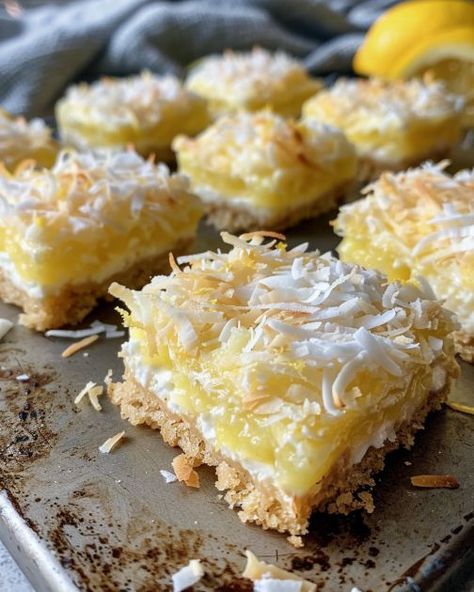 This recipe is a hit! My niece always snags the first one off the table. Definitely a crowd-pleaser. Lemon Coconut Bars, Lemon Squares, Square Recipes, Coconut Bars, Lemon Dessert Recipes, Dessert Bar Recipe, Lemon Coconut, Coconut Cream Pie, Cookie Bar Recipes