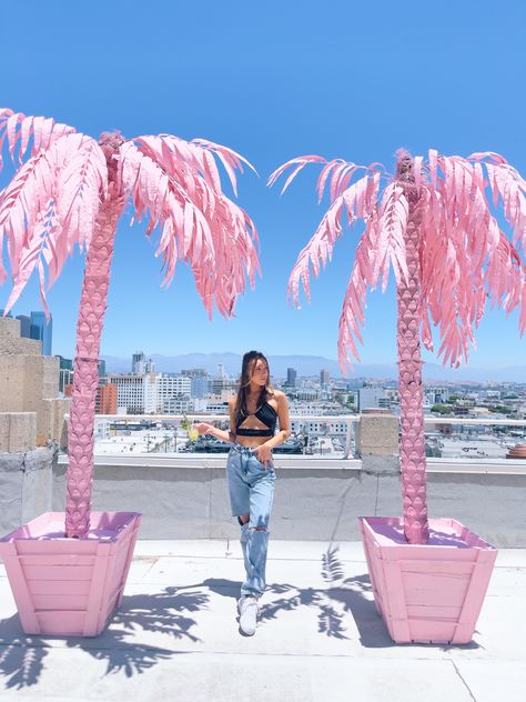 Pink palm trees rooftop casual outfit Palm Springs Patio Ideas, Pink Rooftop, Diy Palm Tree, Palm Tree Decor, Rooftop Pool Party, Diy Pink Palm Tree, Pink Palm Tree, Grass Wall With Neon Sign Pink, Pink Palm Tree Decor