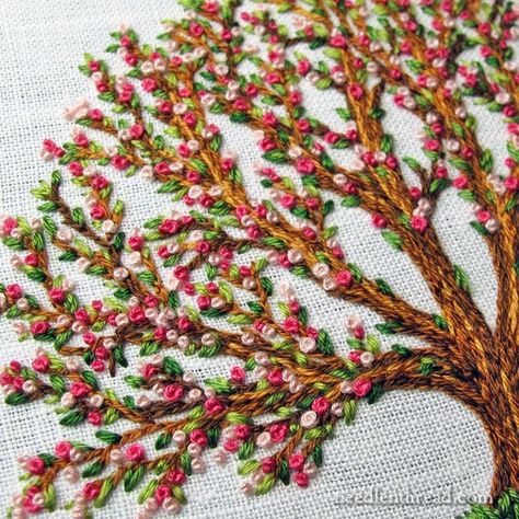 Hand embroidered tree with blossoms by Mary Corbet | The embroidery on the tree consists of three stitches: split stitch, straight stitch (or tiny seed stitches, sometimes doubled), and French knots. Embroidered Tree, French Knot Embroidery, Warm Fuzzies, Embroidery Stitches Tutorial, Pola Sulam, Brazilian Embroidery, French Knots, 자수 디자인, Silk Ribbon Embroidery