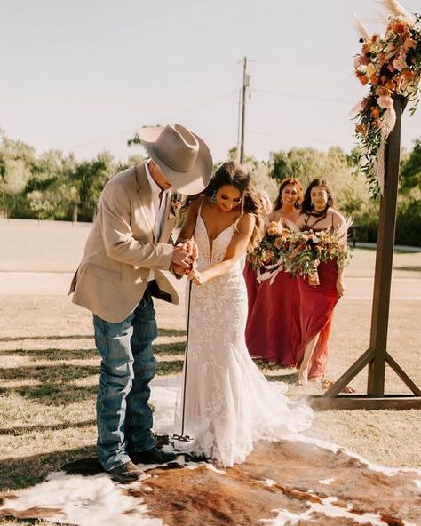 Crystal McCarty on Instagram: "In love with our whole wedding Branding the cowhide: We asked so many different people how they branded their cowhides, if they used an electrical or hot iron brand, how long they held it on for etc. Here is what we learned! We used a regular ole hot iron brand, when the groomsmen walked down the isle they turned the burner on. We used a burner like you use to place your pots on when you boil deer heads (that’s the only way I know how to explain it). And we only h Western Branding, Deer Heads, Western Themed Wedding, Horse Wedding, How To Explain, Country Theme Wedding, Unity Ceremony, Wedding Unity, Different People