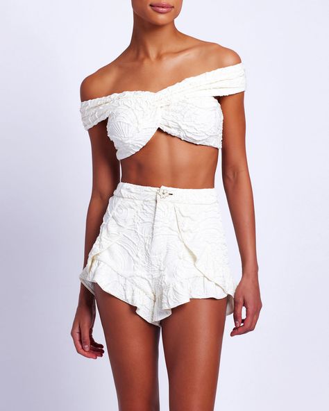 The Jacquard Shorts are part of the Spring 2024 Runway Collection. The shorts are made from a stretch jacquard fabric and feature a front zipper closure. The shorts have a high waist fit just above the navel and a ruffle hem line.Made in Brazil. 93% polyamide 7% elastane. SHO28168US. Shorts Runway, Jacquard Shorts, 2024 Runway, Beach Fits, Runway Collection, Made In Brazil, Bridal Shop, Jacquard Fabric, Beach Dresses