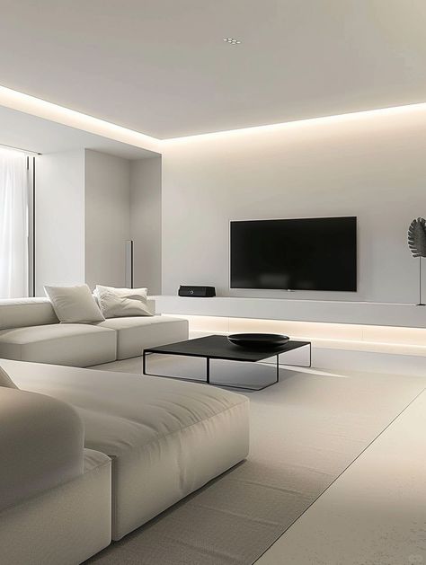 This minimalist decoration takes simplicity and grandeur as its core.
With white as the main color,
The light gray tone of the walls and ceiling is used as a supplement.
Together they create a bright and spacious visual effect.
The combination of TV and black low coffee table,
Not only practical and modern,
At the same time, the use of black elements also enhances the sense of stability in the space. Clean Minimalist Living Room, Low Ceiling Design, Minimalist Tv Wall, Low Ceiling Living Room, Color In Interior Design, Gray Room, Minimal Living Room, Latest Living Room Designs, Low Coffee Table