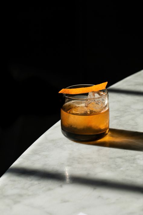 Photography created by Sarah King of SK Photography. Old fashioned cocktail sitting on marble bartop. Los Angeles, Cocktail Dark Aesthetic, Cocktail Editorial Photography, Cocktail Styling Photography, Whiskey Lifestyle Photography, Old Fashioned Cocktail Photography, Old Fashioned Cocktail Aesthetic, Moody Cocktail Photography, Flash Food Photography