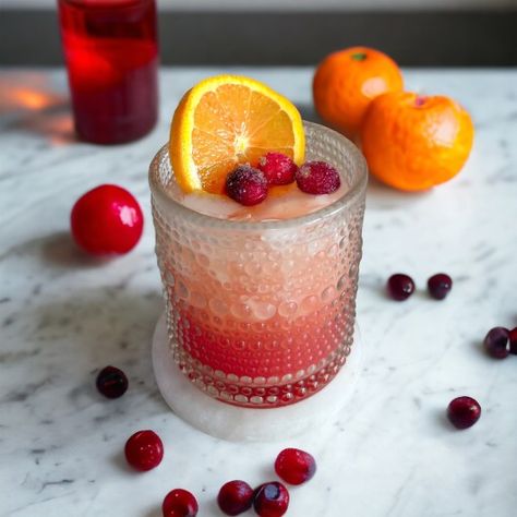 Cranberry Orange Fizz Cocktail - Styled By Daisies Cranberry Orange Fizz Cocktail, Cranberry Orange Fizz, Cranberry Orange Gin Fizz, Cranberry Fizz Poppi, Cranberry Fizz Cocktail, Christmas Batch Drinks, Cranberry Ginger Ale Cocktail, Cranberry Cocktails Thanksgiving, Ginger Ale Cocktail