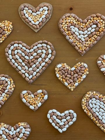 Cardboard Heart Seed Mosaics – Good Weekend Seed Art For Kids, Seed Mosaics, Seed Mosaic, Repurposed Cardboard, Cardboard Heart, Hispanic Heritage Month Crafts, Seed Craft, Afternoon Crafts, Thanksgiving Crafts Preschool