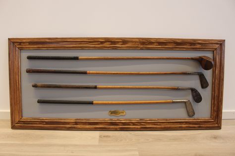 Custom golf club display - Made by LexLektor  The background is coloured matt grey, while the sides are antique Brown, coated With varnish. All Clubs are fixed With steel wire. Check out my DIY-blog at: https://lexlektor.wordpress.com/2015/03/09/golf-club-display-custom-work/ Golf Club Display, Vintage Golf Clubs, Golf Room, New Golf Clubs, Best Golf Clubs, Golf Decor, Golf 6, Top Golf, Vintage Golf