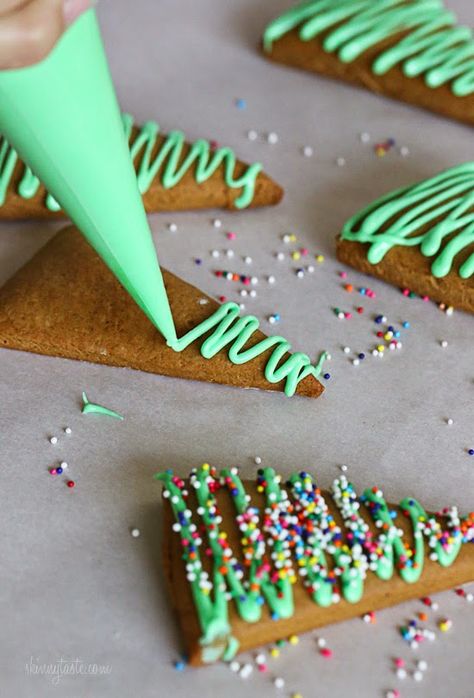 Easy Gingerbread Christmas Tree Cookies. | Skinnytaste Jul Kaka, Gingerbread Christmas Tree, Tree Cookies, Christmas Tree Cookies, Xmas Cookies, Christmas Sweets, Xmas Food, Gingerbread Christmas, Christmas Snacks